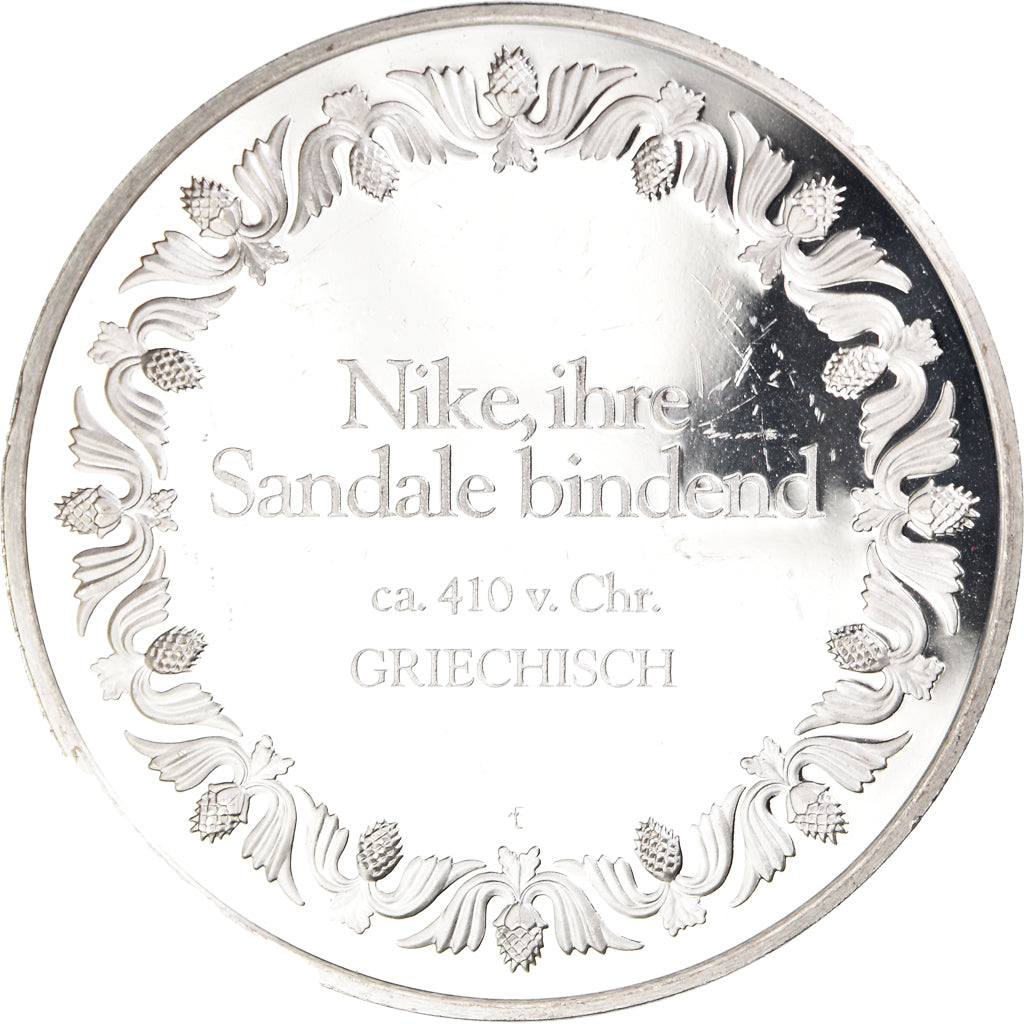 França, medalha, Nikè ajustant sa sandale - Grece, Artes e Cultura, AU(55-58)